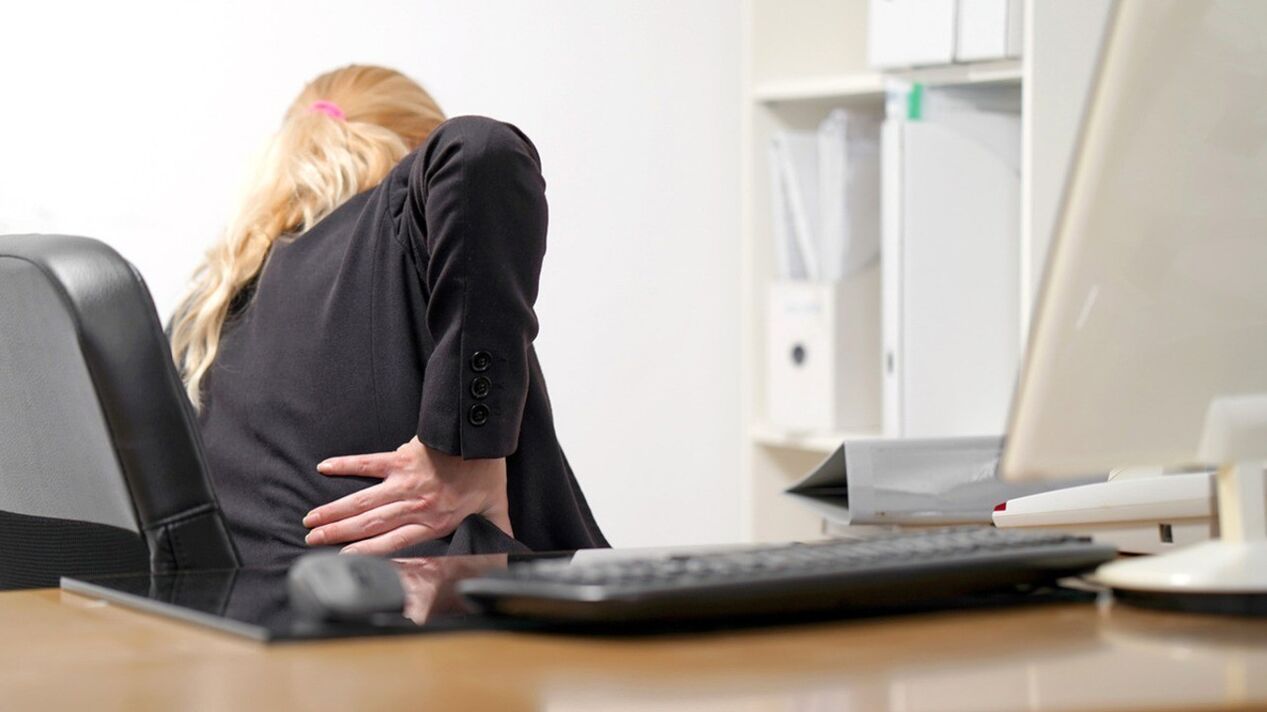 A woman is worried about pain in her lower back